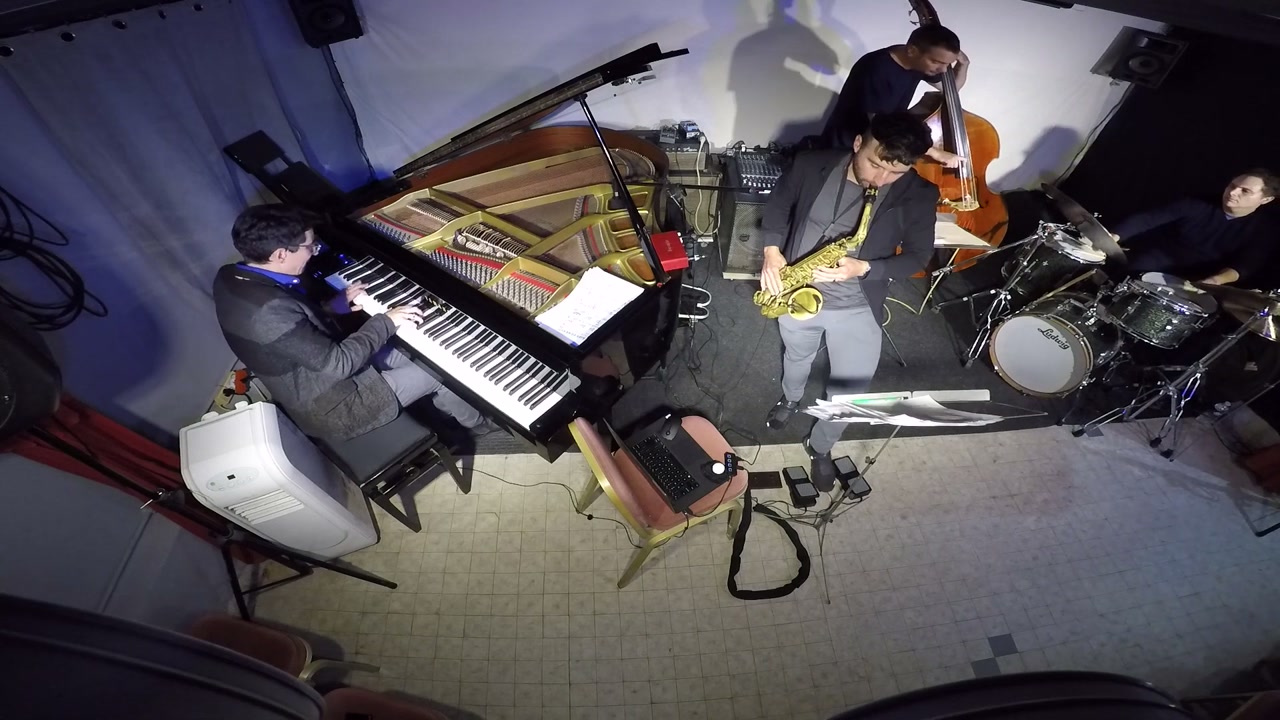 Aleks Fadini, Josiah Boornazian, bass, and drums performing in Nice